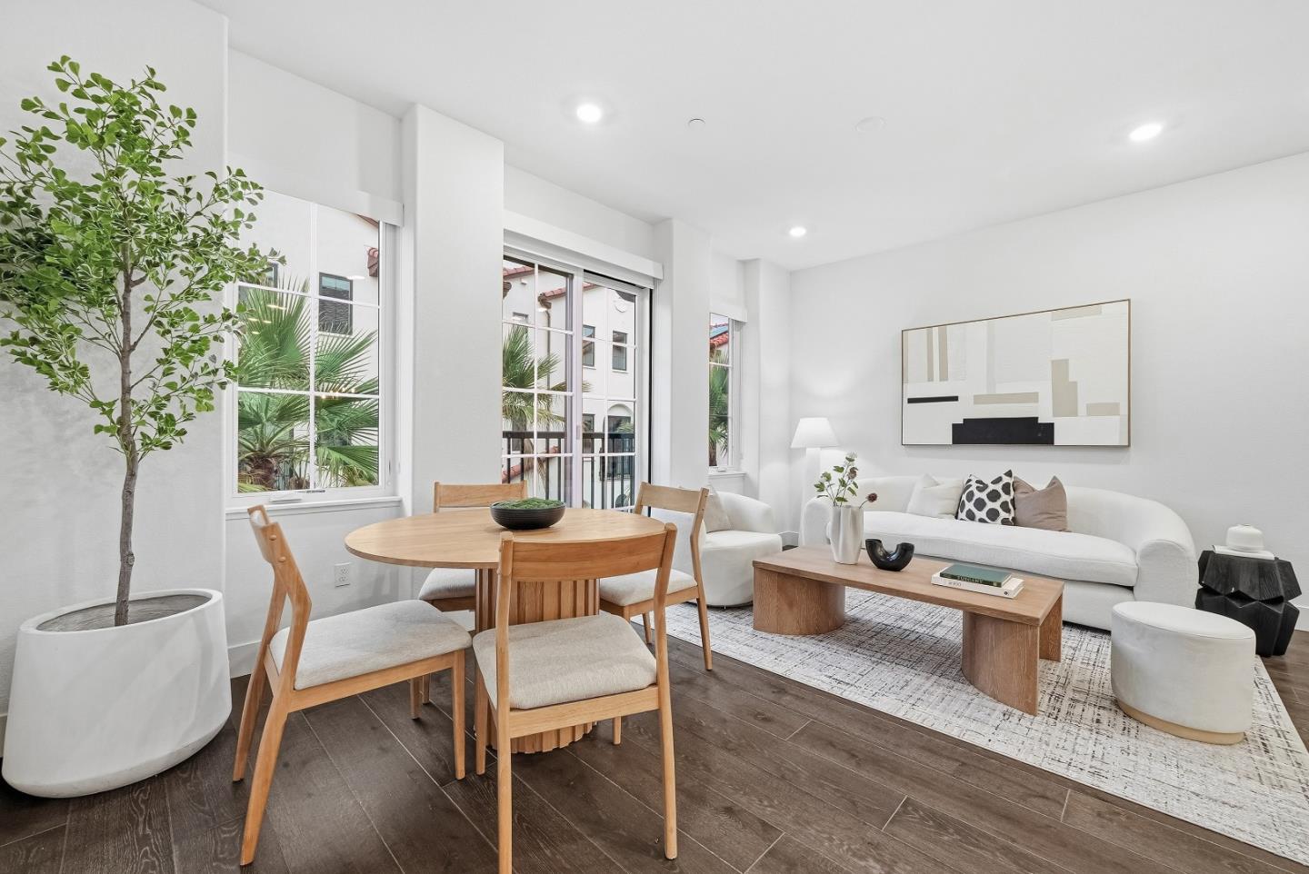 21504 Point Reyes Terrace Cupertino, CA 95014 - Photo 6 of 55 a living room with furniture and a potted plant
