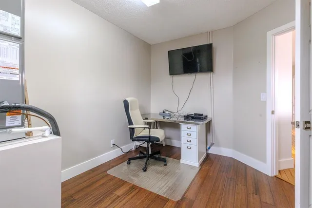 a view of a swimming pool with a patio and yard