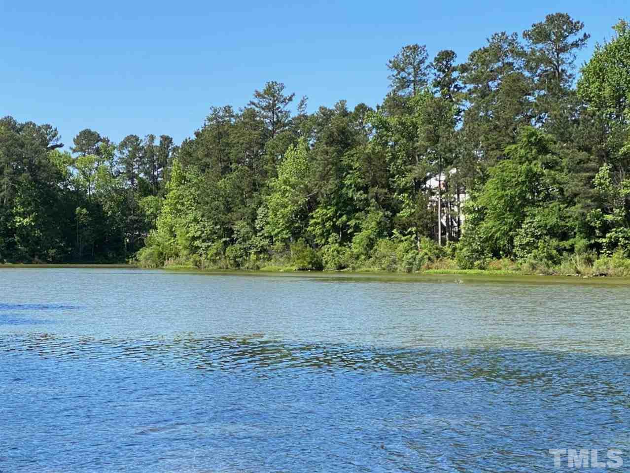 7780 Silver View Lane Raleigh, NC 27613 - Photo 11 of 30 A beautiful, winding path leads from the backyard to Dunnaway Pond. If you are a bird watcher you may want to bring your binoculars when you tour the property.