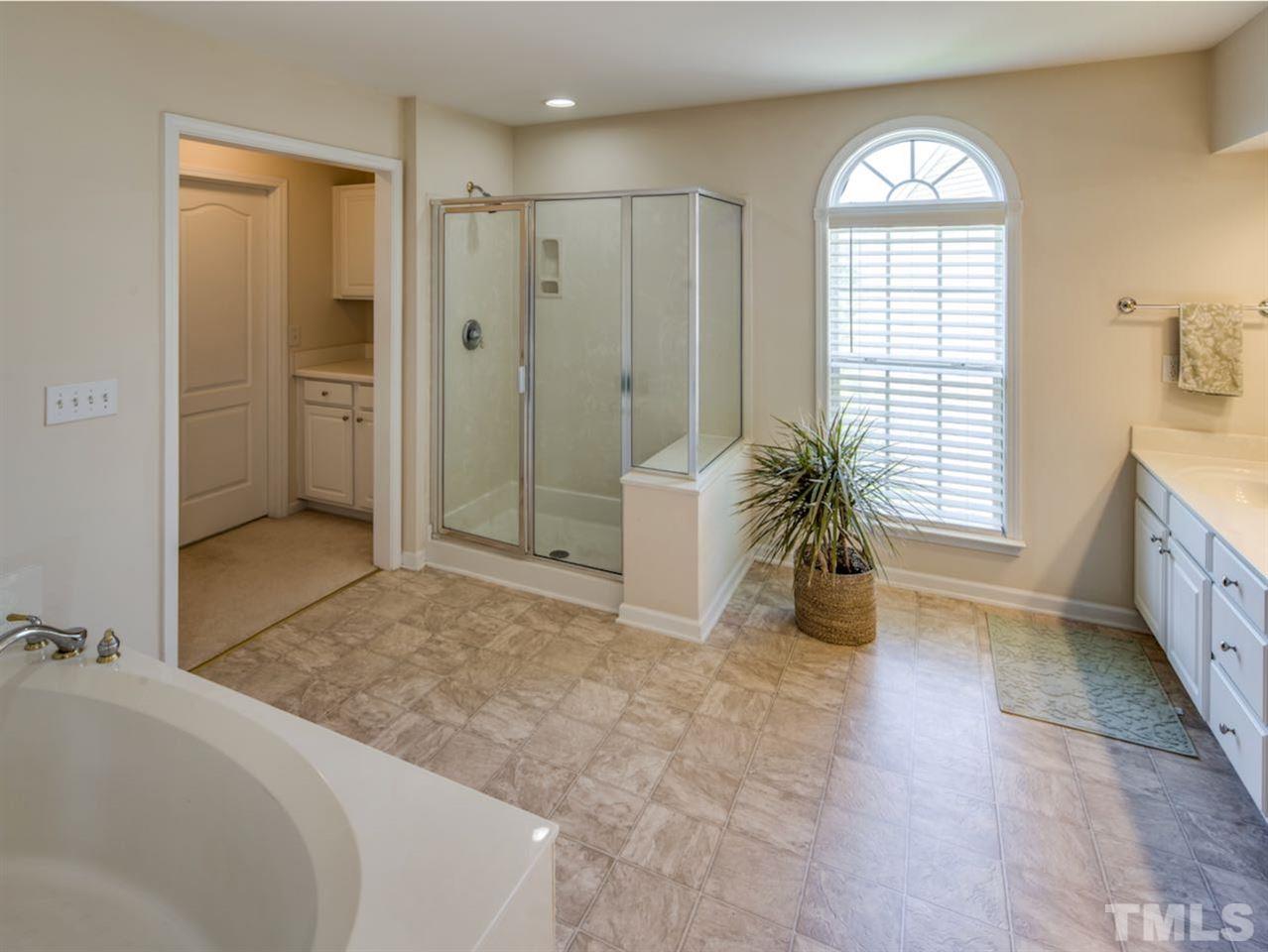 7780 Silver View Lane Raleigh, NC 27613 - Photo 13 of 30 That's right—last year the sellers installed a tankless water heater so I suspect that you will never run out of hot water.
