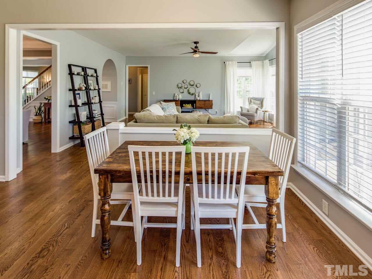 7780 Silver View Lane Raleigh, NC 27613 - Photo 8 of 30 The breakfast area has its own clearly defined space and yet it is also open to both the kitchen and the family room.