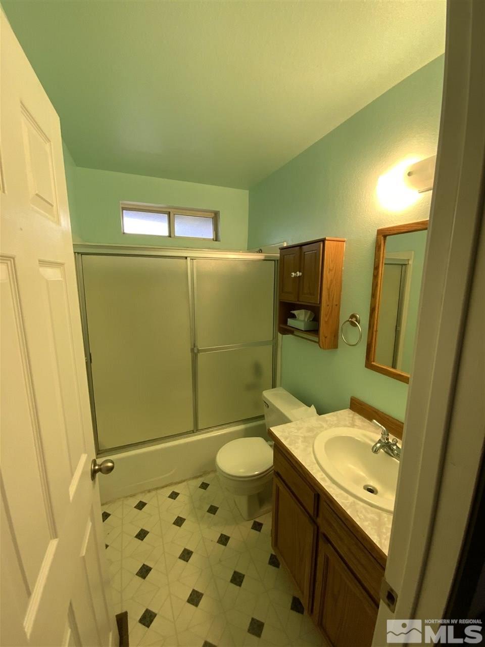 1500 Lattin Road Fallon, NV 89406 - Photo 8 of 17 a bathroom with a sink a toilet and shower