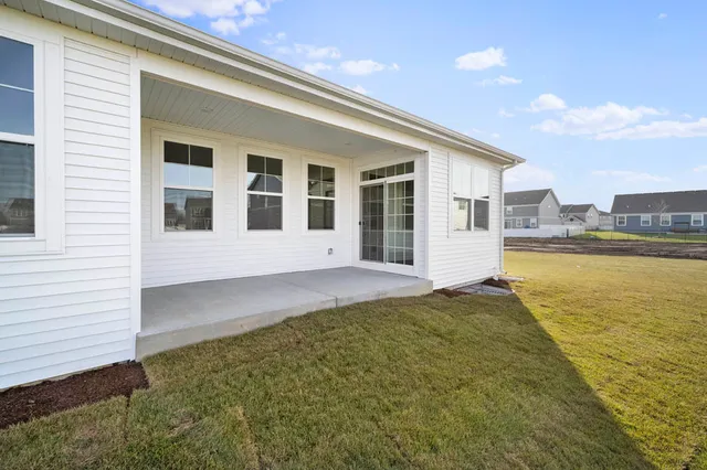 a view of a house with a swimming pool