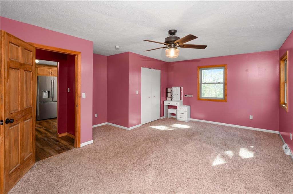 201 Colleen Street Butler, PA 16001 - Photo 28 of 33 a view of empty room with window and ceiling fan
