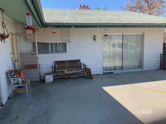 1302 South Mahan Street Ridgecrest, CA 93555 - Photo 13 of 17 a view of livingroom with furniture and staircase