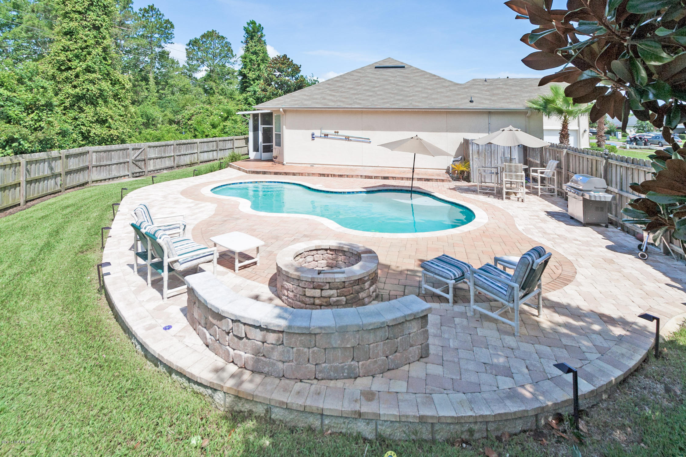 773 West Devonhurst Lane Ponte Vedra, FL 32081 - Photo 12 of 16 a view of a swimming pool with outdoor seating