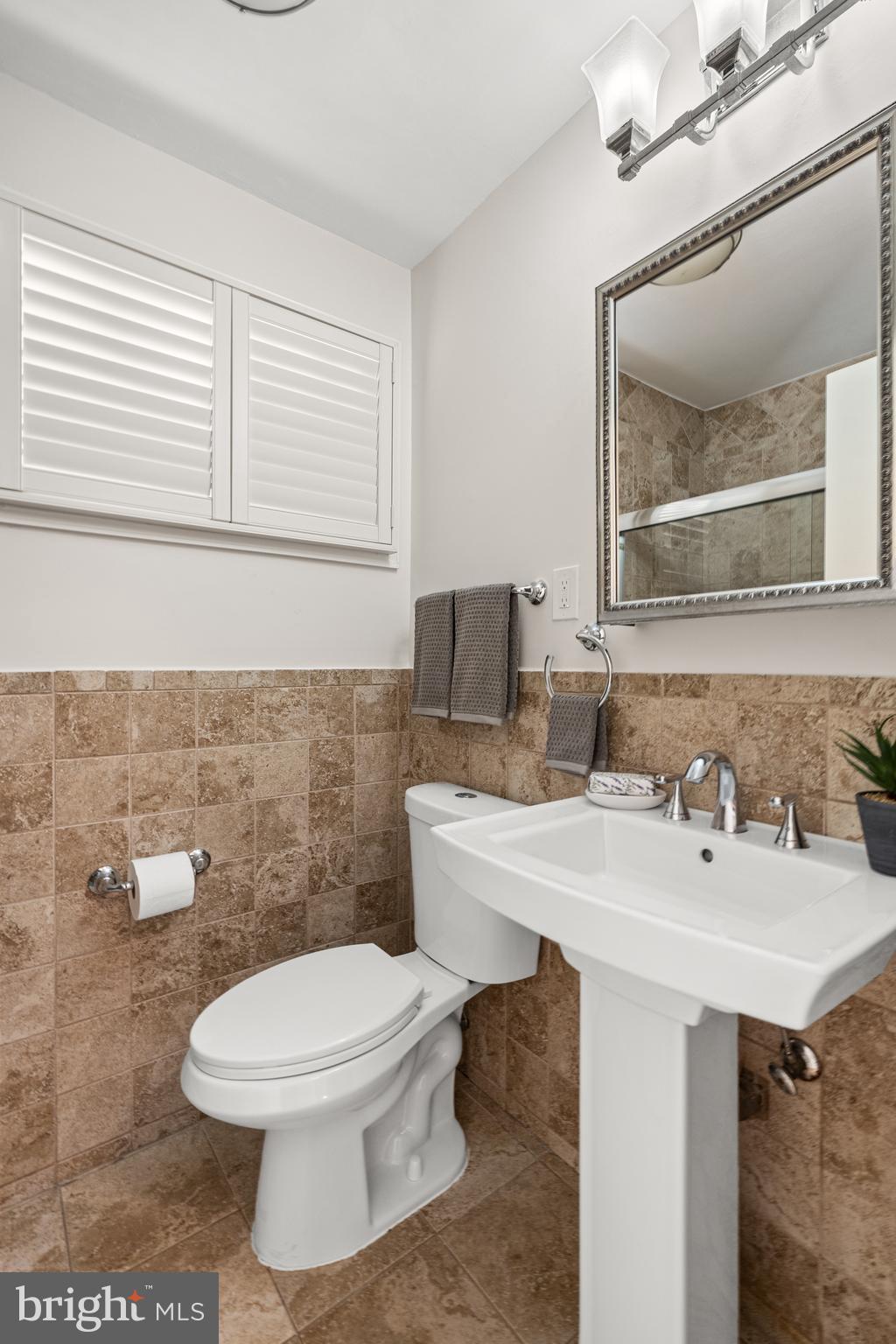 10618 Cavalier Drive Silver Spring, MD 20901 - Photo 12 of 26 Main level renovated bathroom.