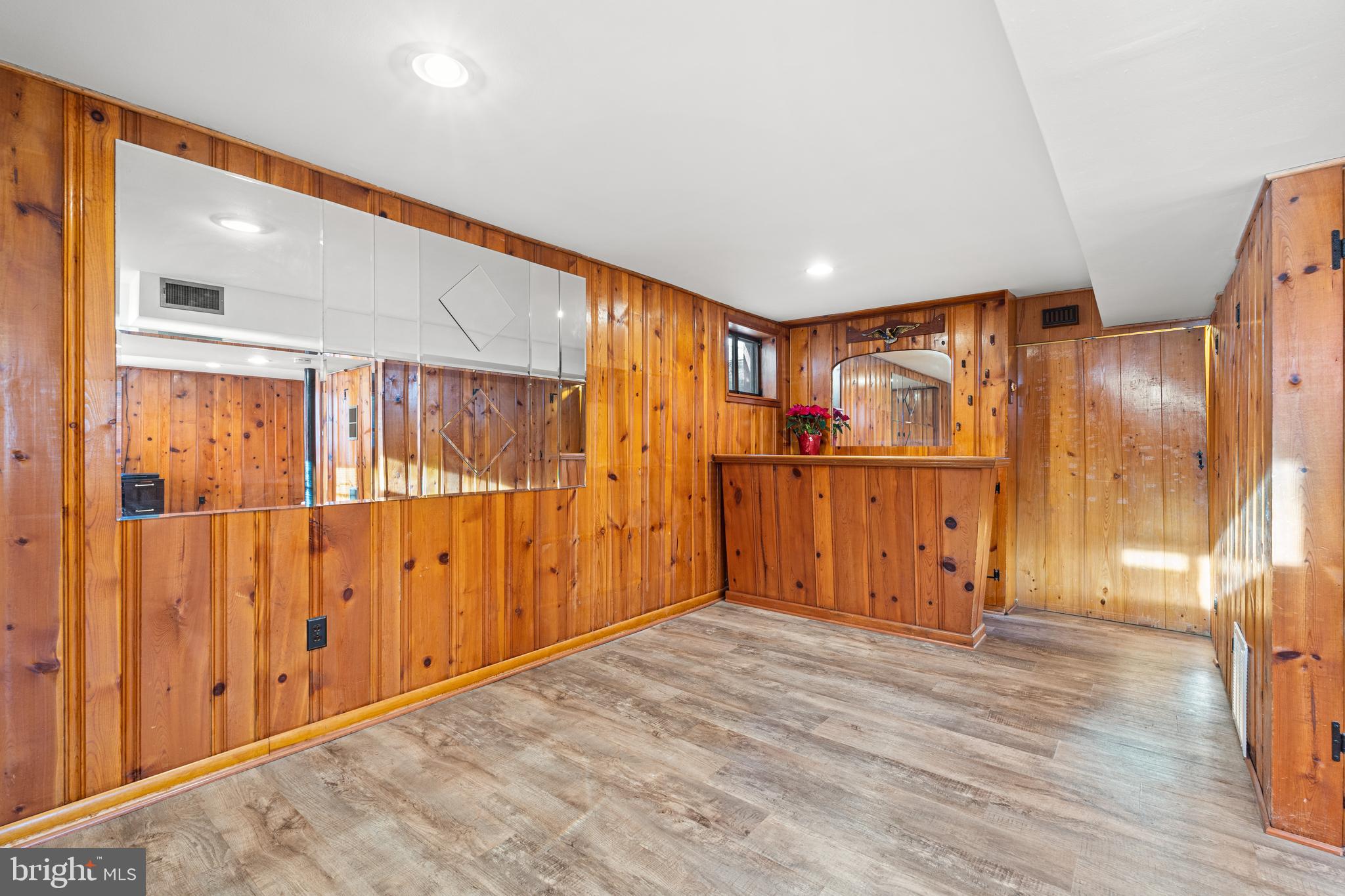 10618 Cavalier Drive Silver Spring, MD 20901 - Photo 17 of 26 Classic mid century solid pine paneling & bar.