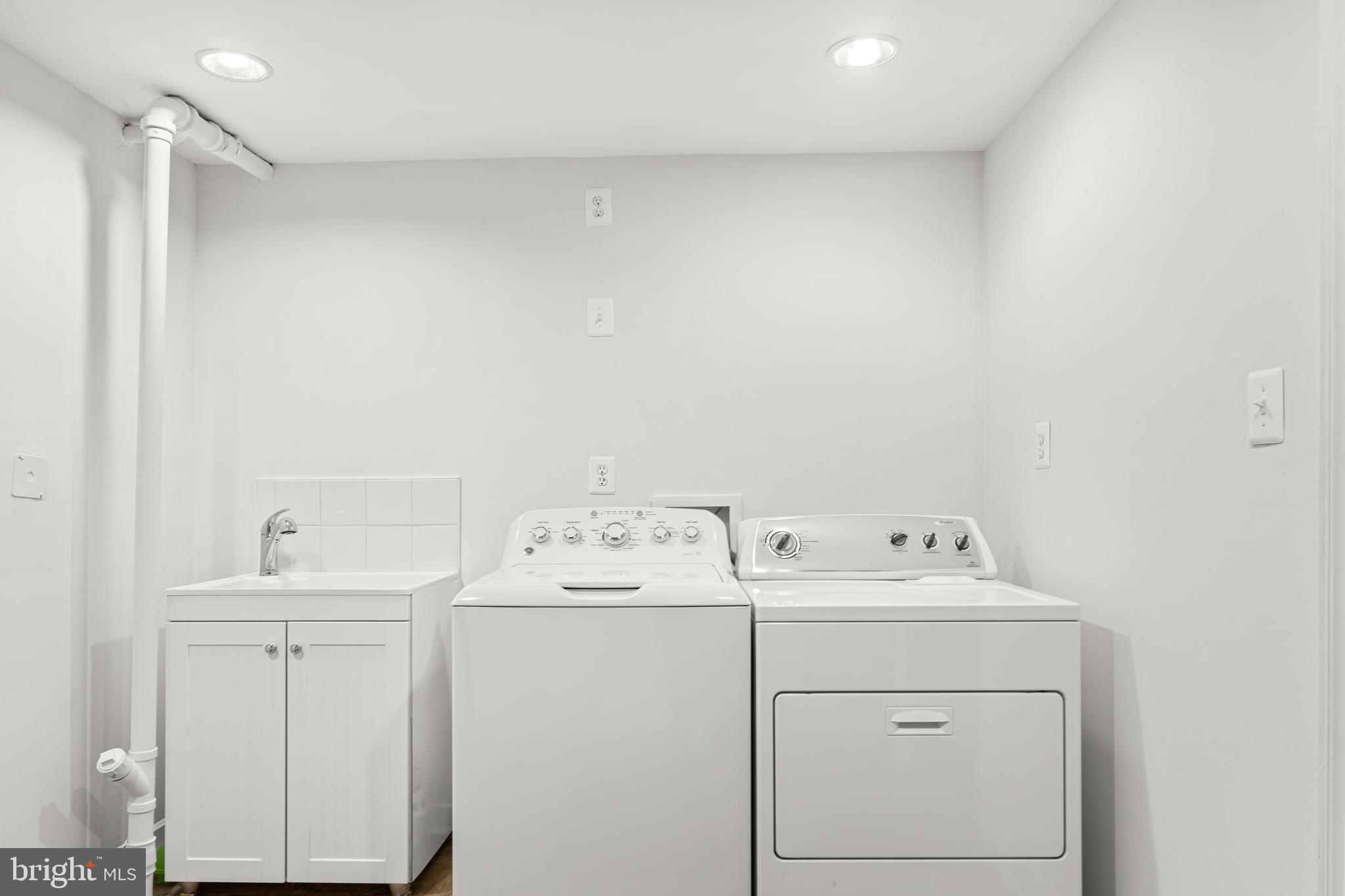 10618 Cavalier Drive Silver Spring, MD 20901 - Photo 19 of 26 Newly renovated laundry room w/utility tub.