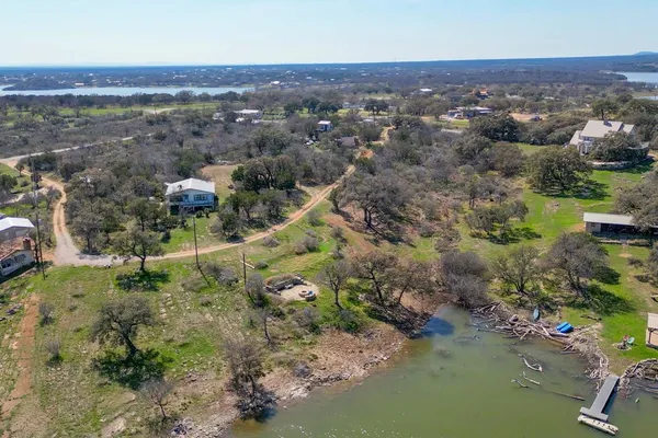 a view of a backyard of a house