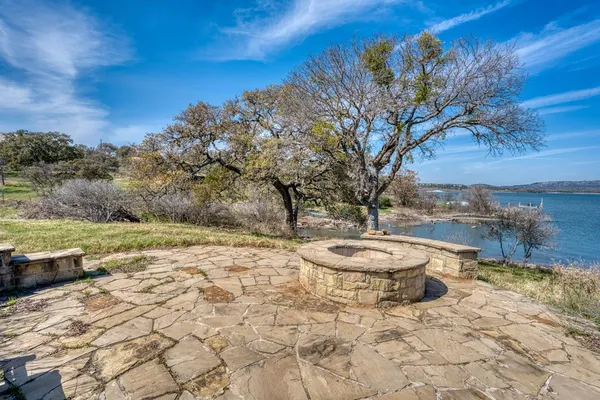 a view of a lake with outdoor space