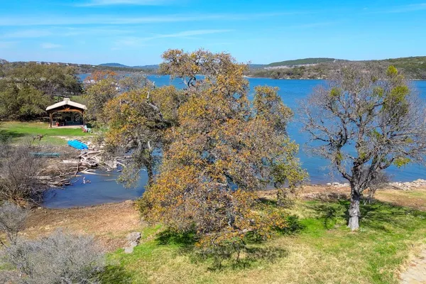 a view of a lake with mountains in the background