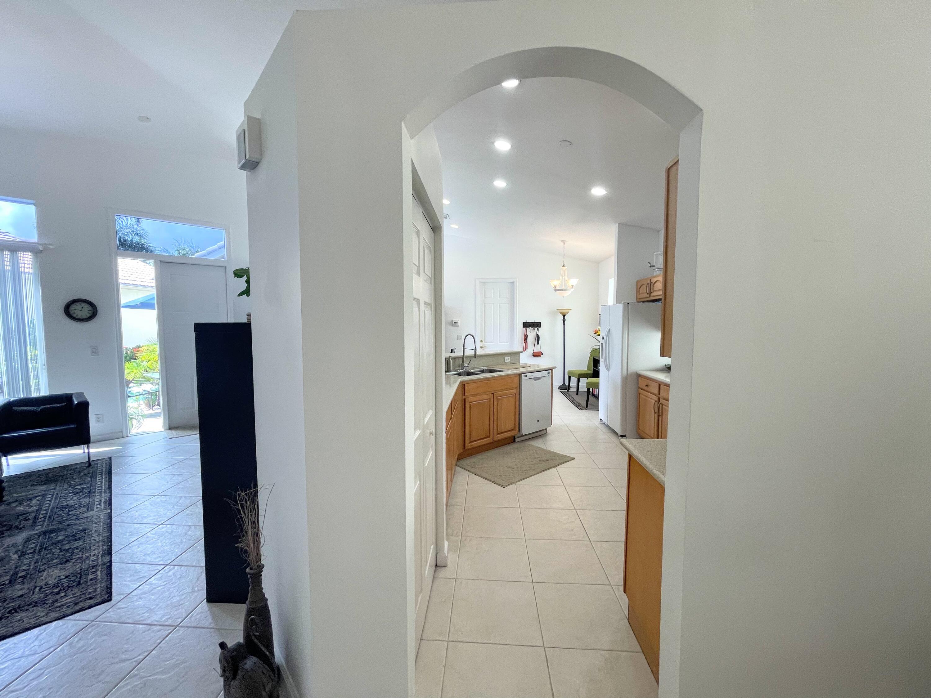 7060 Northwest Turtle Walk Boca Raton, FL 33487 - Photo 23 of 51 entry to kitchen