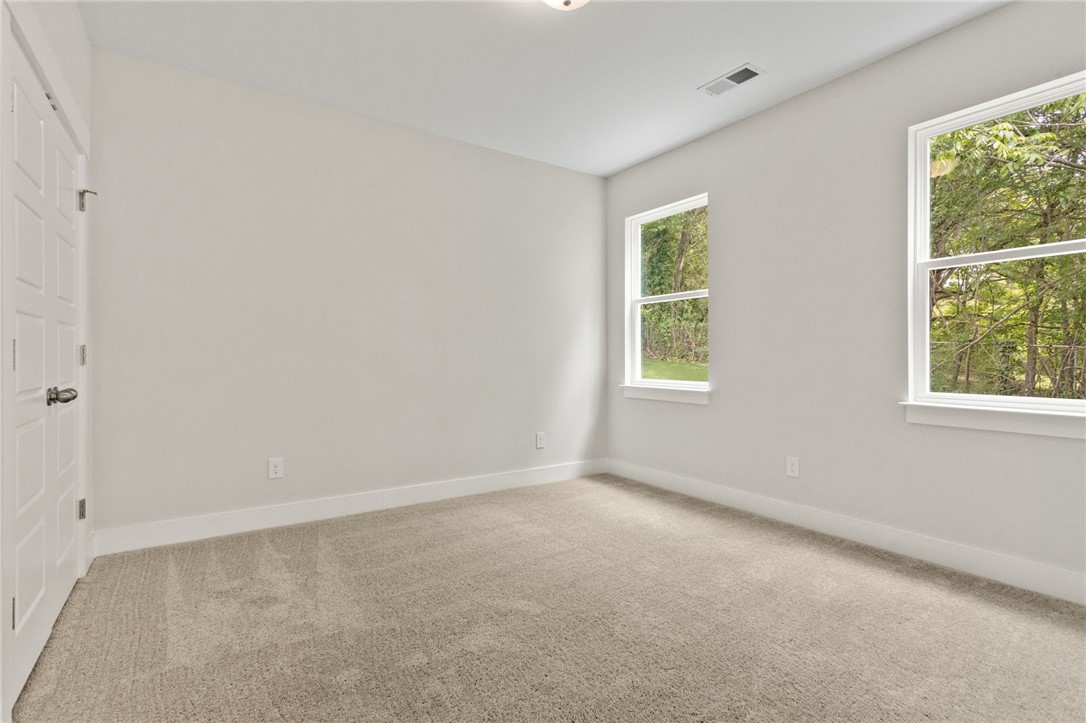 315 Old Shirley Road Central, SC 29630 - Photo 7 of 26 This sun-drenched bedroom offers a blank canvas for personalization.