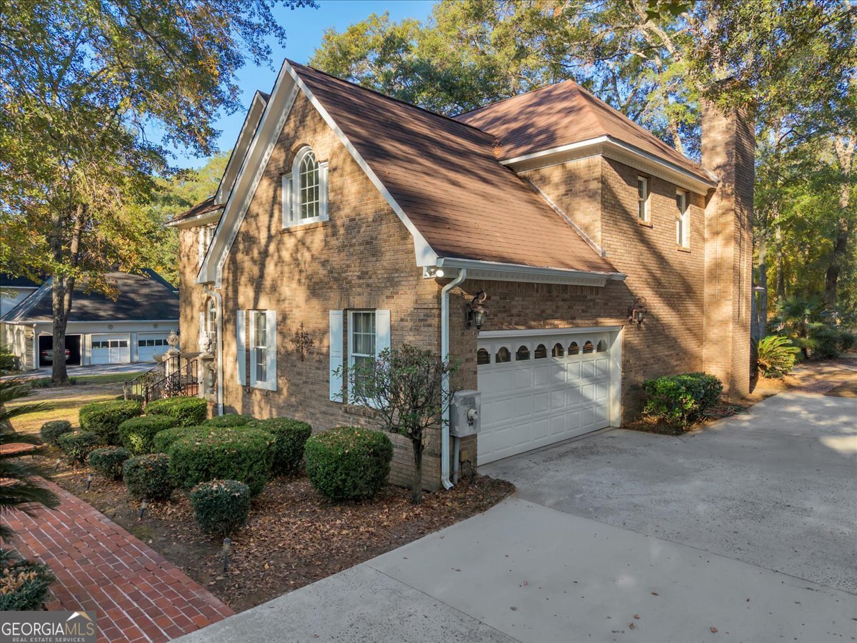 1015 Cherokee Road Perry, GA 31069 - Photo 2 of 71 a view of a house with a yard