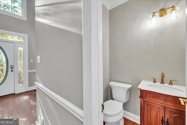 a bath tub sitting in a bathroom next to a window