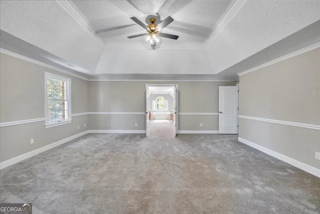 a view of a bathroom with a toilet a sink and a window