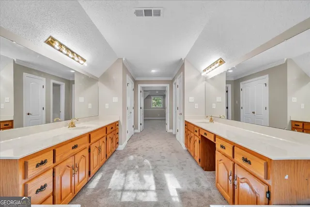 a view of entryway with a front door and wooden floor