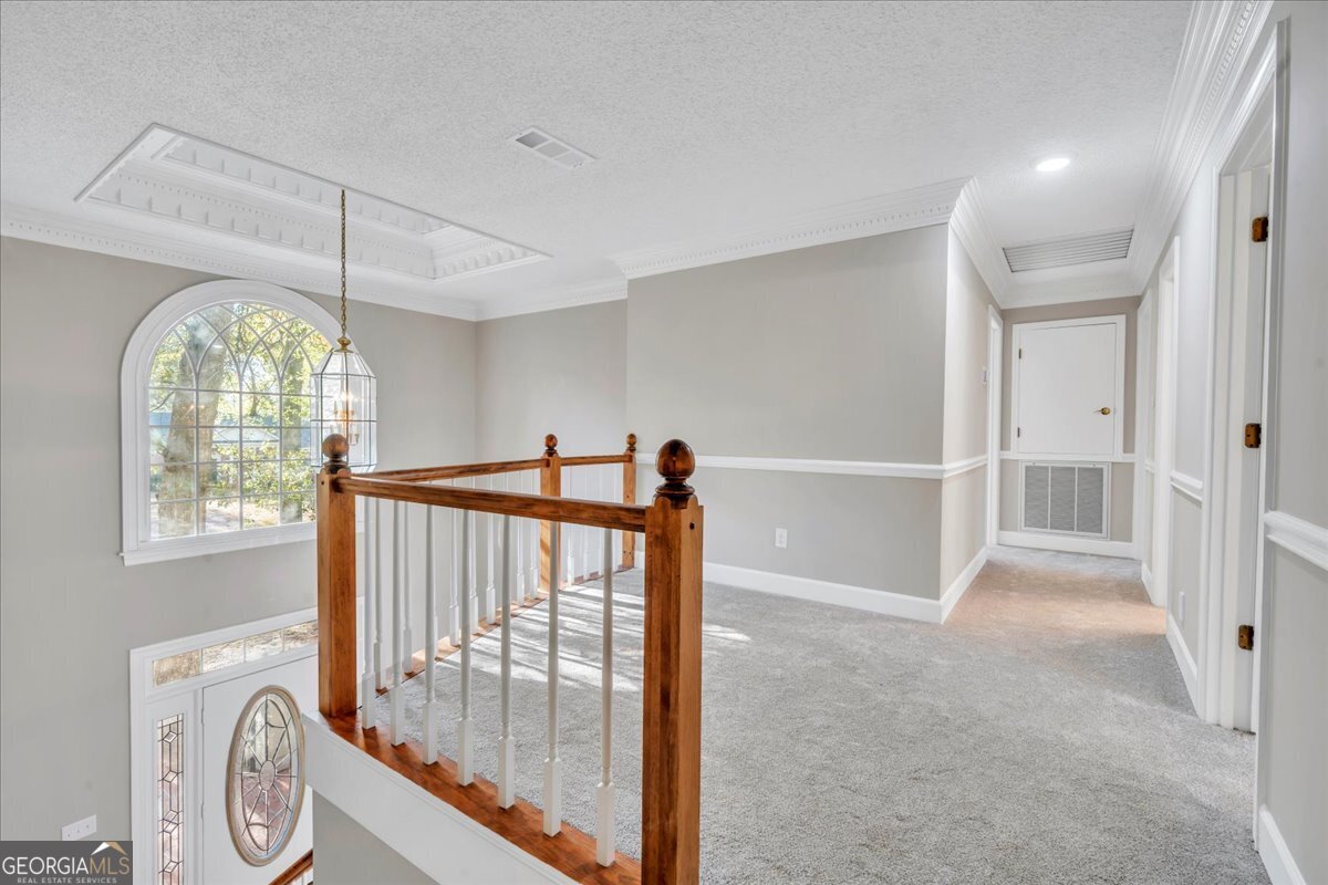 1015 Cherokee Road Perry, GA 31069 - Photo 36 of 71 a view of entryway with a front door and wooden floor