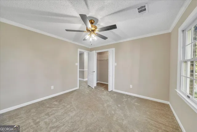 a view of yard with patio