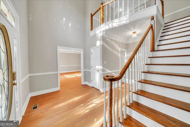 a view of entryway with wooden floor