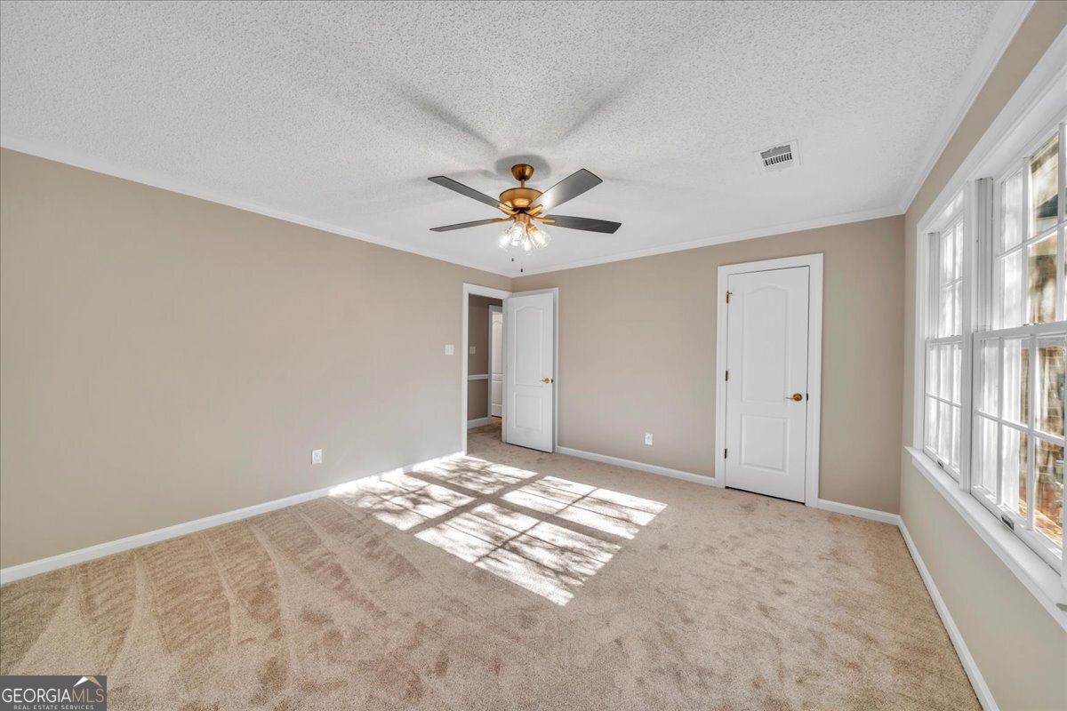 1015 Cherokee Road Perry, GA 31069 - Photo 45 of 71 a view of a livingroom with a ceiling fan and window