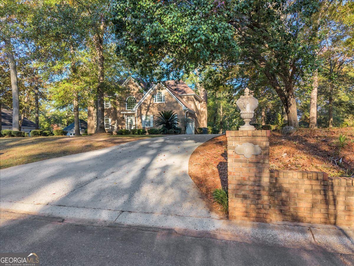 1015 Cherokee Road Perry, GA 31069 - Photo 57 of 71 a view of a yard with large trees