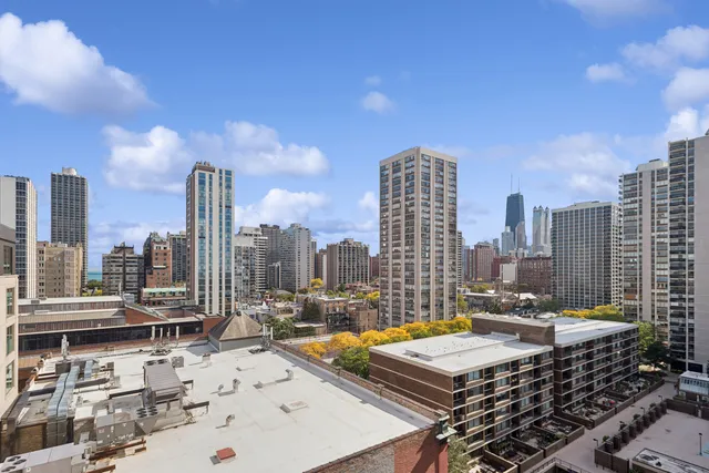 a view of city with tall buildings