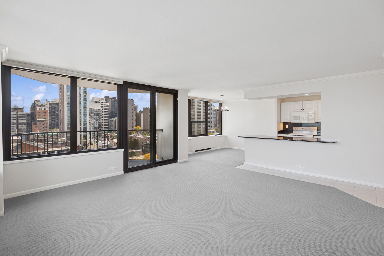 1560 North Sandburg Terrace, Unit 1412 Chicago, IL 60610 - Photo 3 of 16 a view of an empty room with a window