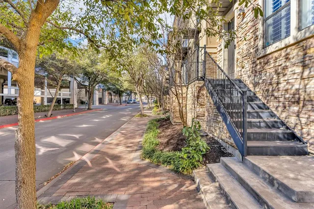 a view of a livingroom with furniture and a fireplace