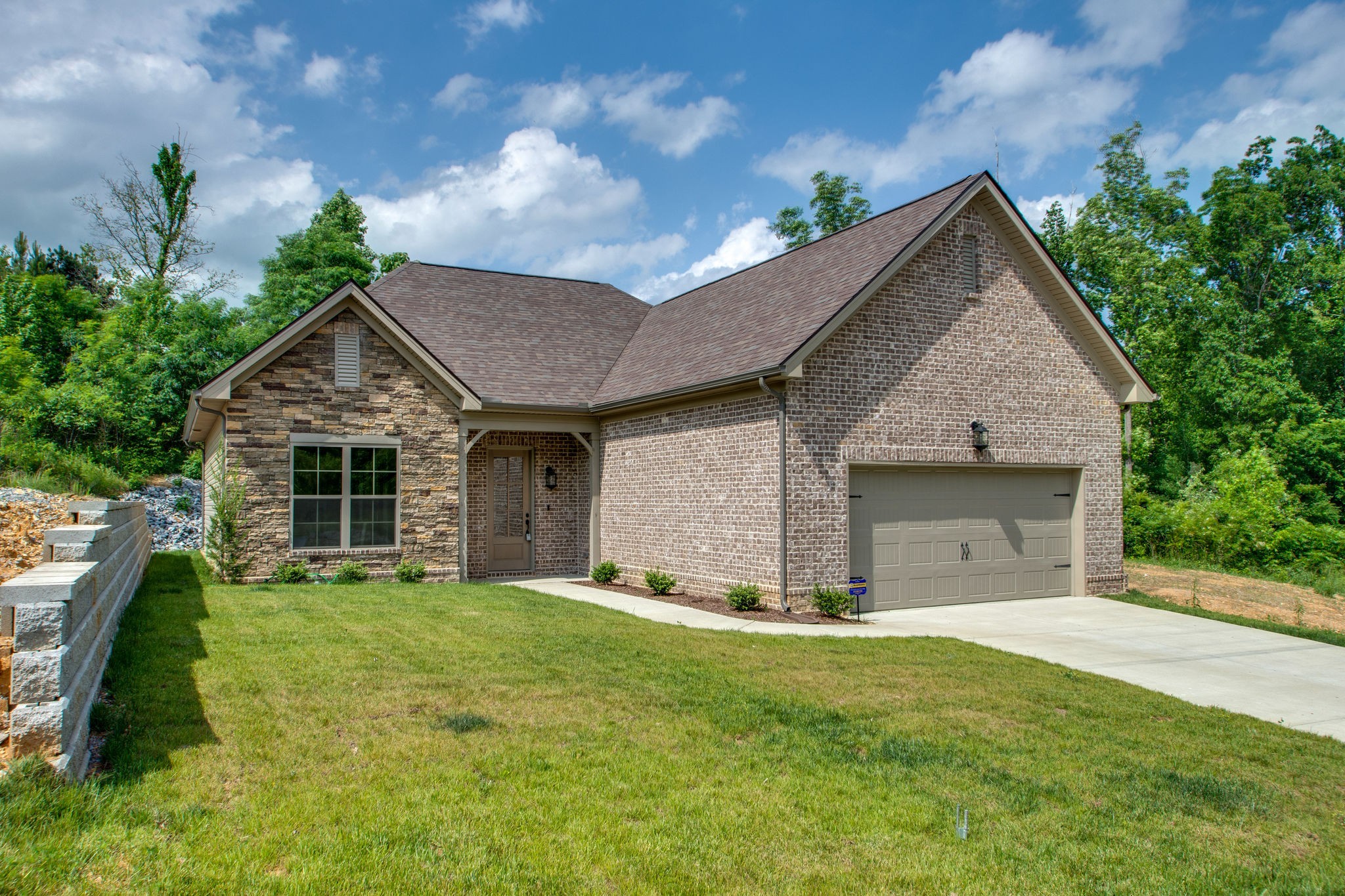 946 Hunters Lane Springfield, TN 37172 - Photo 22 of 24 a view of a house with a yard and a garden