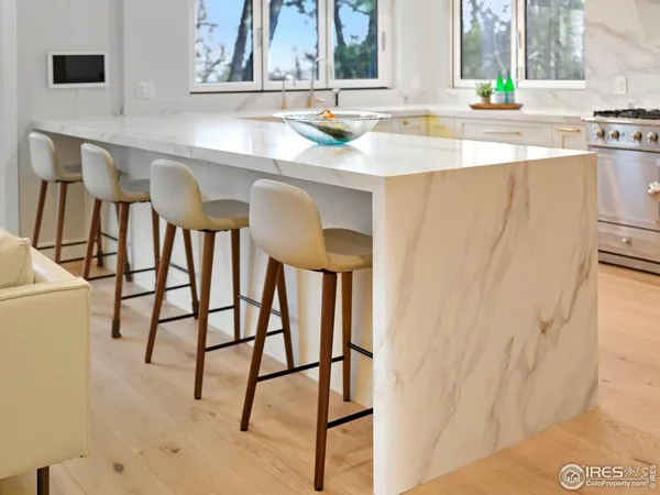 a kitchen with a sink and a window
