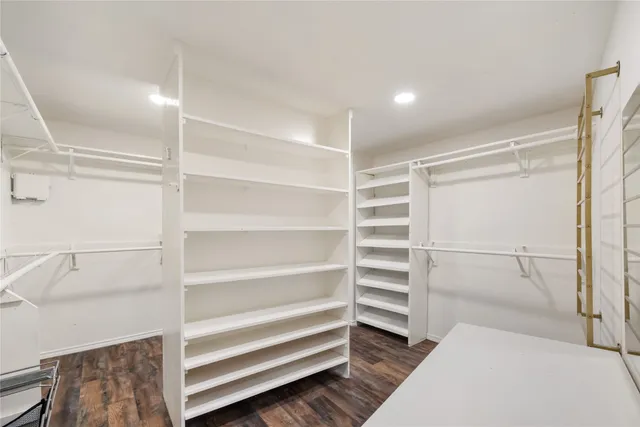 a view of an empty walk in closet