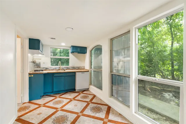 a room with window and stairs