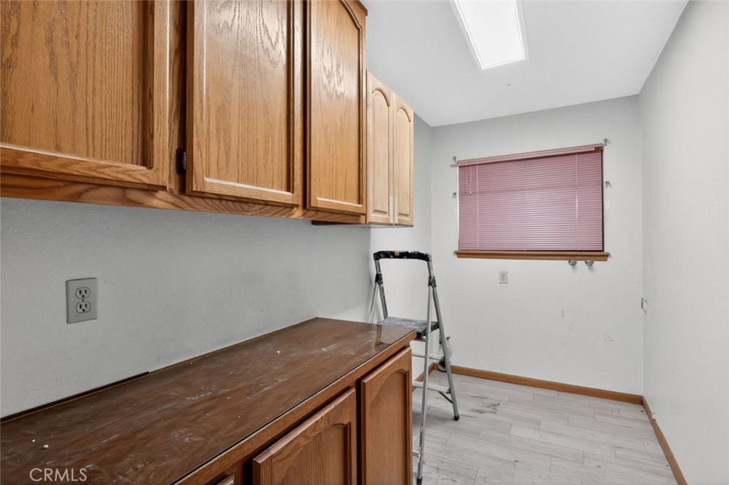 18539 Symeron Road Apple Valley, CA 92307 - Photo 30 of 30 a room with storage and utility