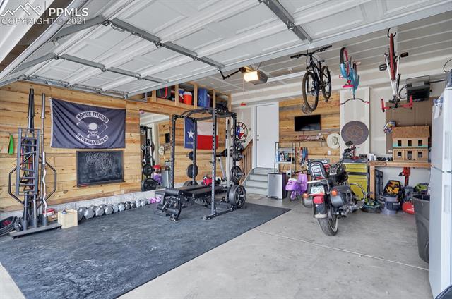 5215 Gentle Wind Road Colorado Springs, CO 80922 - Photo 32 of 43 Finished and heated garage