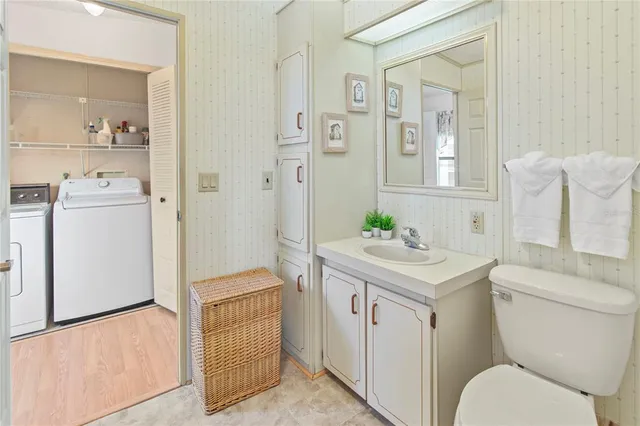 a view of a house with a door and wooden walls