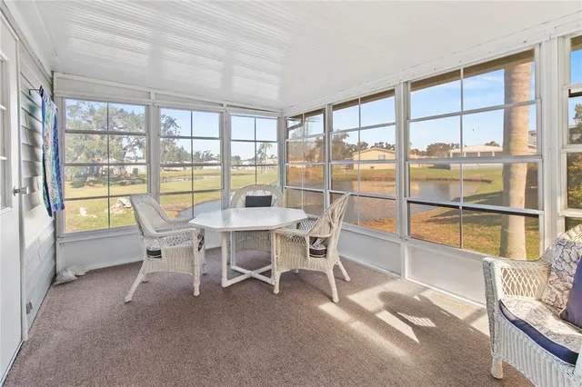 a picture of a counter top space with appliances and white walls