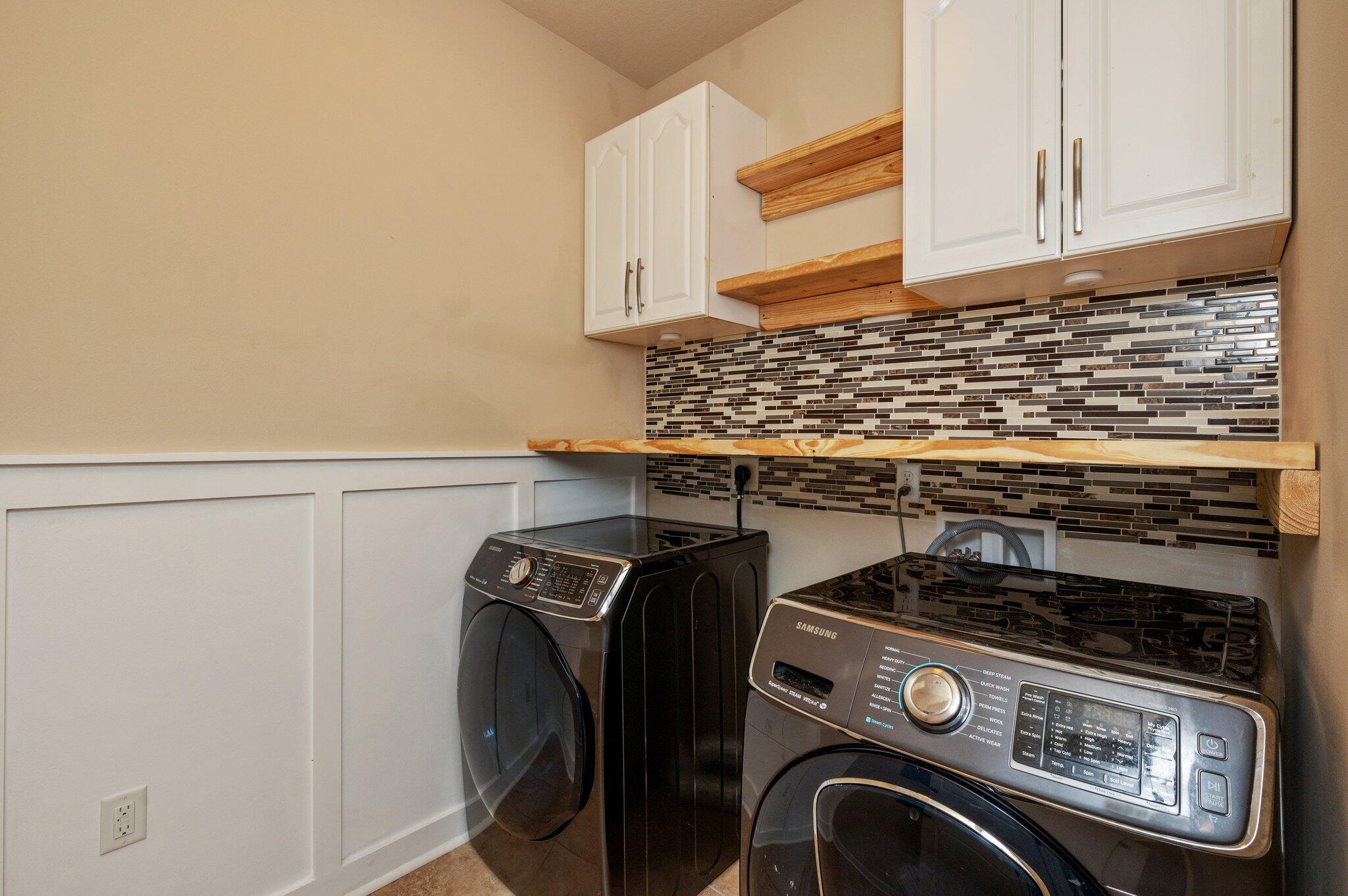 4434 Mirada Way Crestview, FL 32539 - Photo 36 of 42 a utility room with dryer and washer