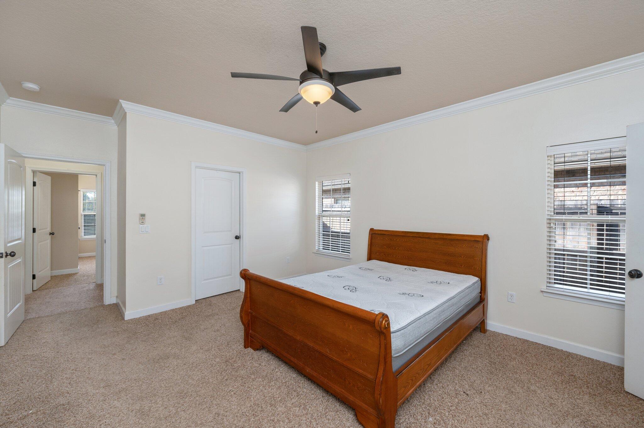 4434 Mirada Way Crestview, FL 32539 - Photo 8 of 42 a bedroom with a bed and window