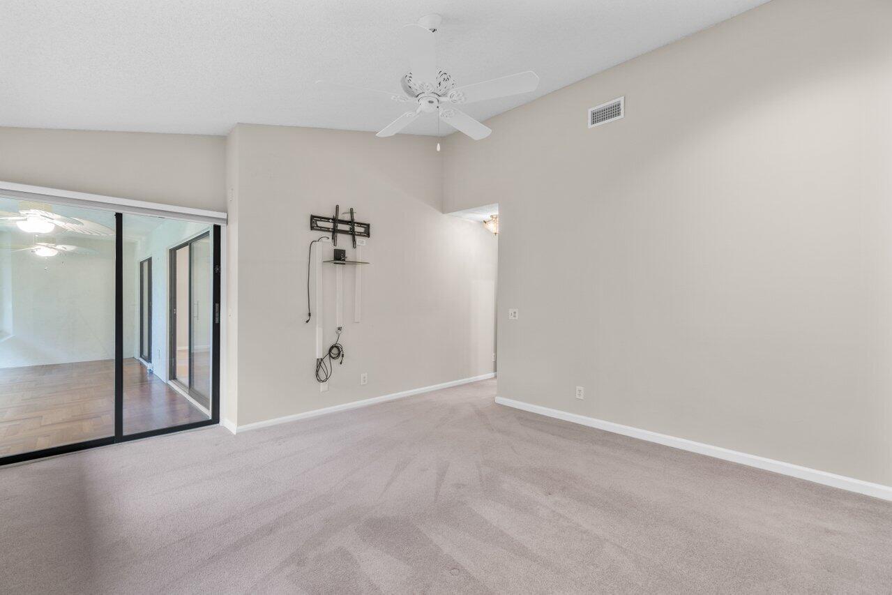 5630 Coach House Circle, Unit G Boca Raton, FL 33486 - Photo 18 of 31 PRIMARY BEDROOM