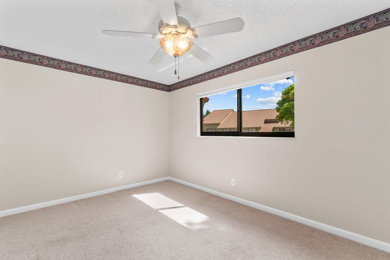 5630 Coach House Circle, Unit G Boca Raton, FL 33486 - Photo 22 of 31 GUEST BEDROOM