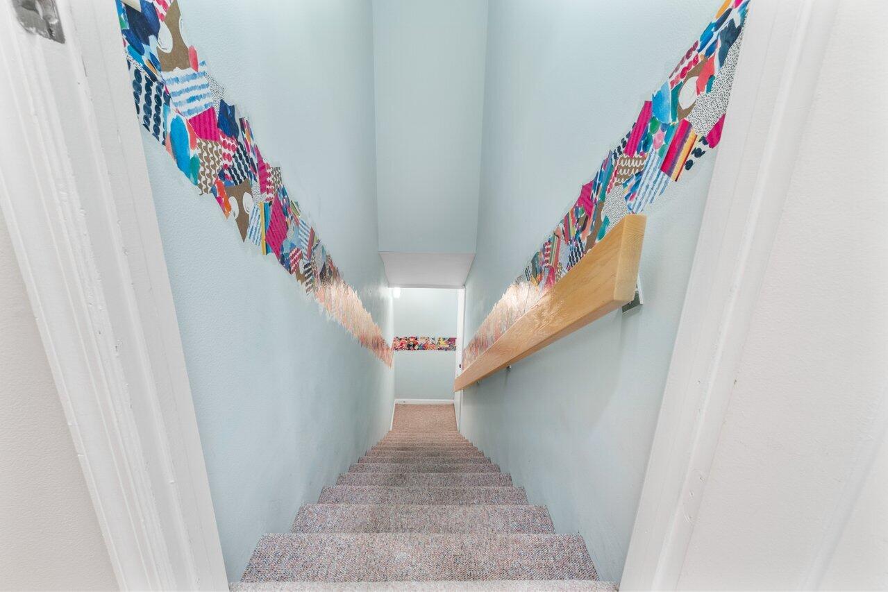 5630 Coach House Circle, Unit G Boca Raton, FL 33486 - Photo 25 of 31 PRIVATE STAIRCASE TO GARAGE