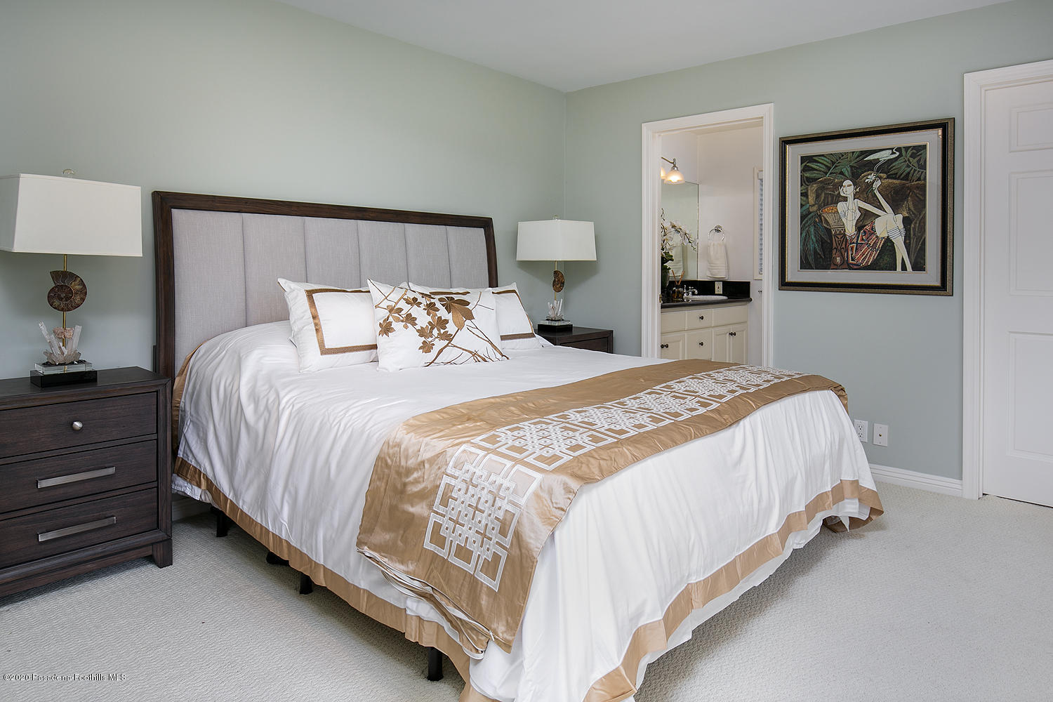 2855 Sheffield Road San Marino, CA 91108 - Photo 20 of 36 a bed sitting in a bedroom and a lamp on a dresser