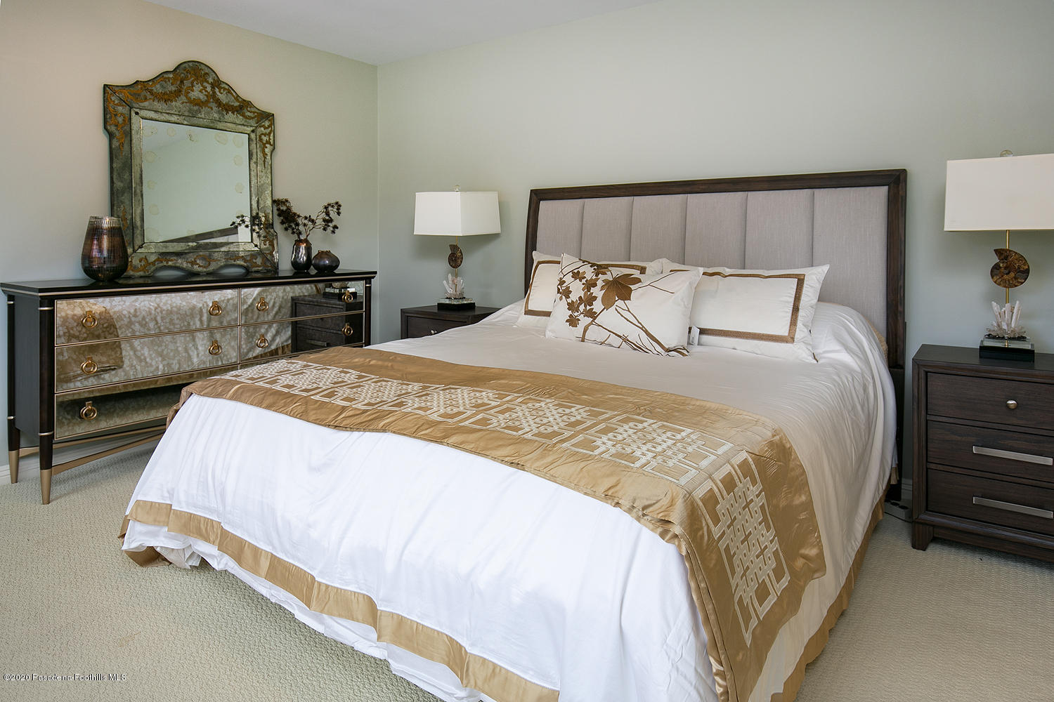 2855 Sheffield Road San Marino, CA 91108 - Photo 21 of 36 a bedroom with a bed and a mirror on dresser