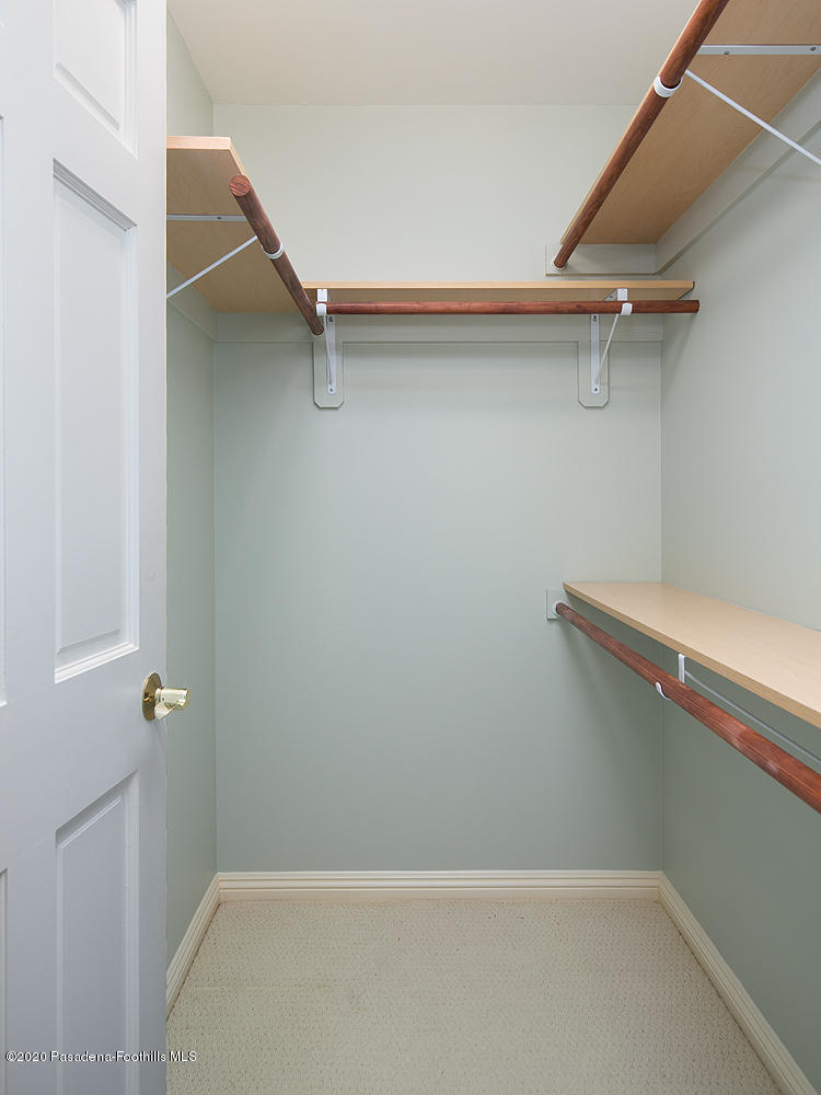 2855 Sheffield Road San Marino, CA 91108 - Photo 23 of 36 a view of a room with racks on the wall