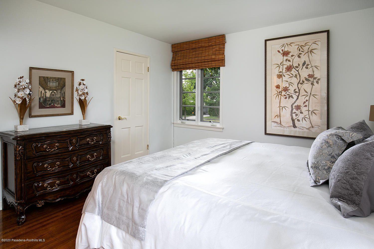 2855 Sheffield Road San Marino, CA 91108 - Photo 29 of 36 a bedroom with a bed a couch and a window