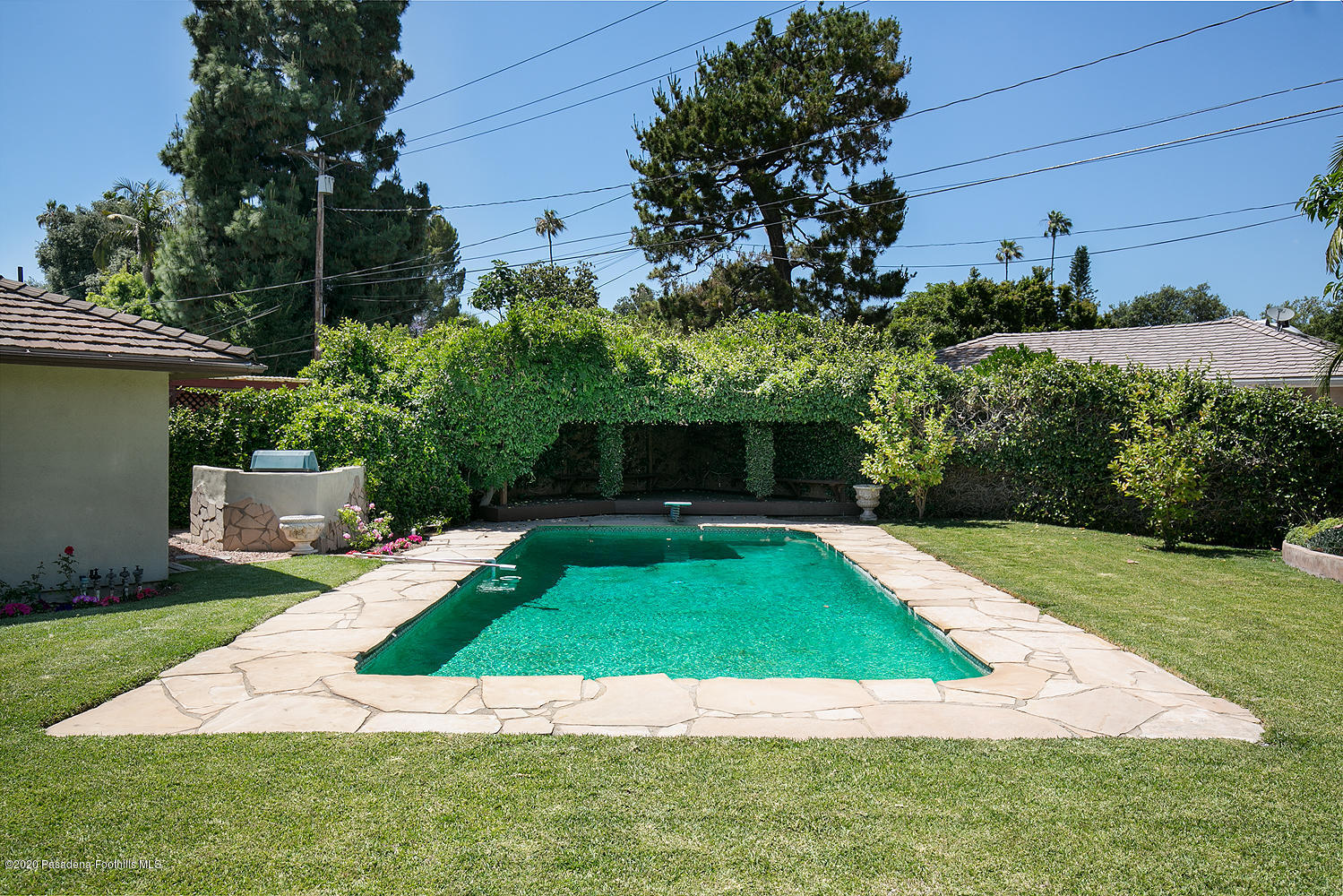 2855 Sheffield Road San Marino, CA 91108 - Photo 30 of 36 a view of a backyard with plants and a garden