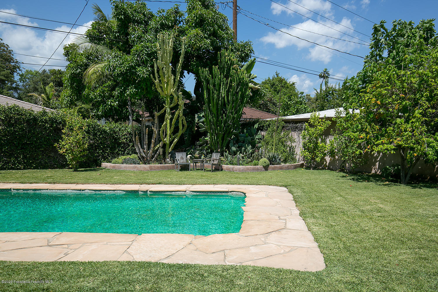 2855 Sheffield Road San Marino, CA 91108 - Photo 32 of 36 a view of a yard with a swimming pool