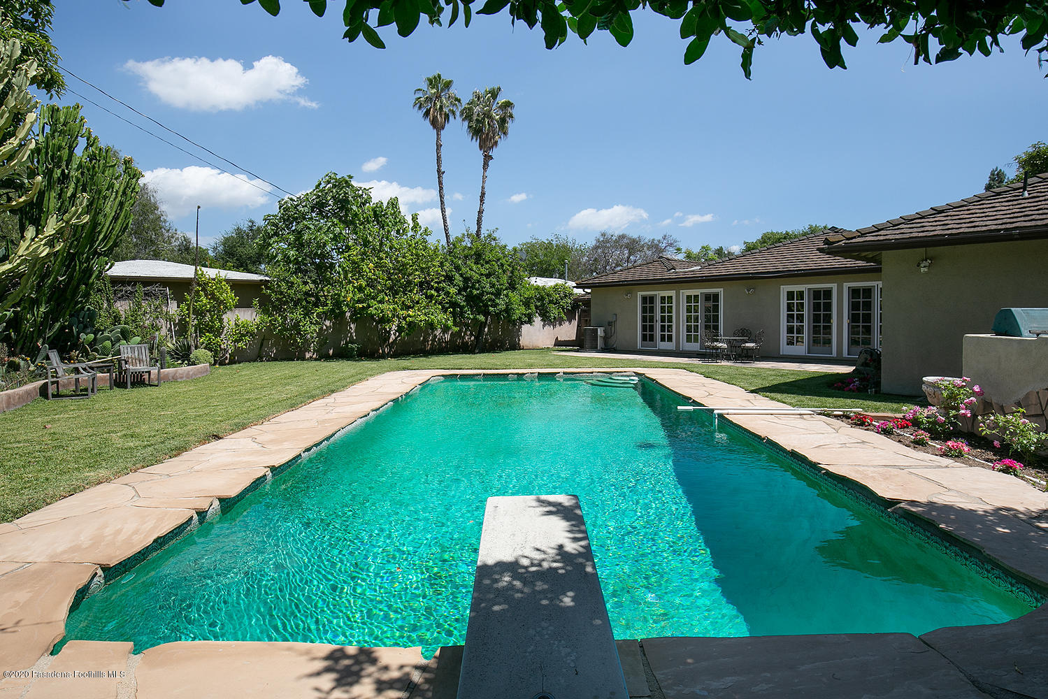 2855 Sheffield Road San Marino, CA 91108 - Photo 35 of 36 a view of a house with a swimming pool